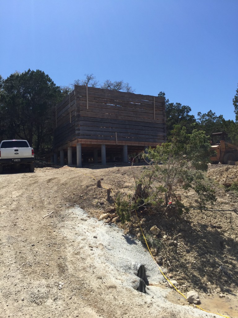 The trees behind the house will keep the extension cool